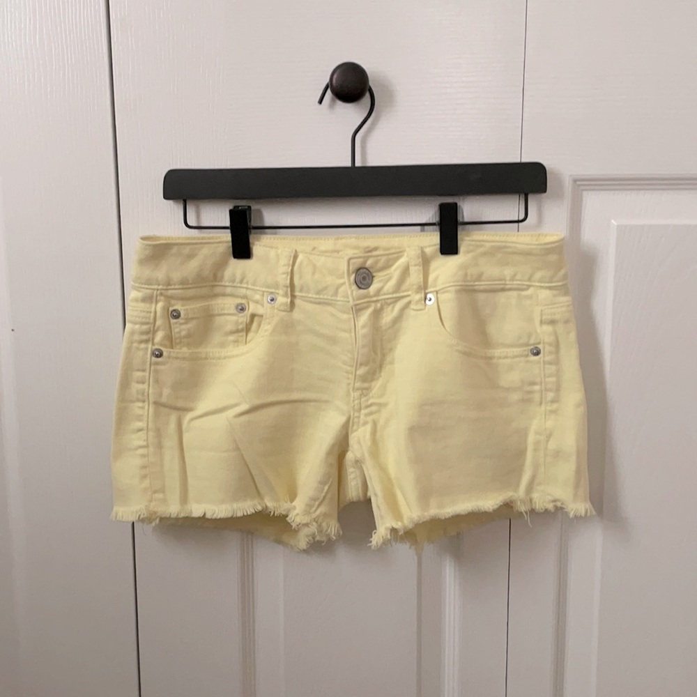Yellow American Eagle Stretch Shorts.